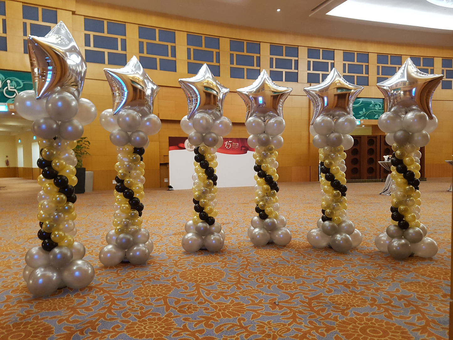 A Pair of Lead-way Balloon Columns with Star On Top