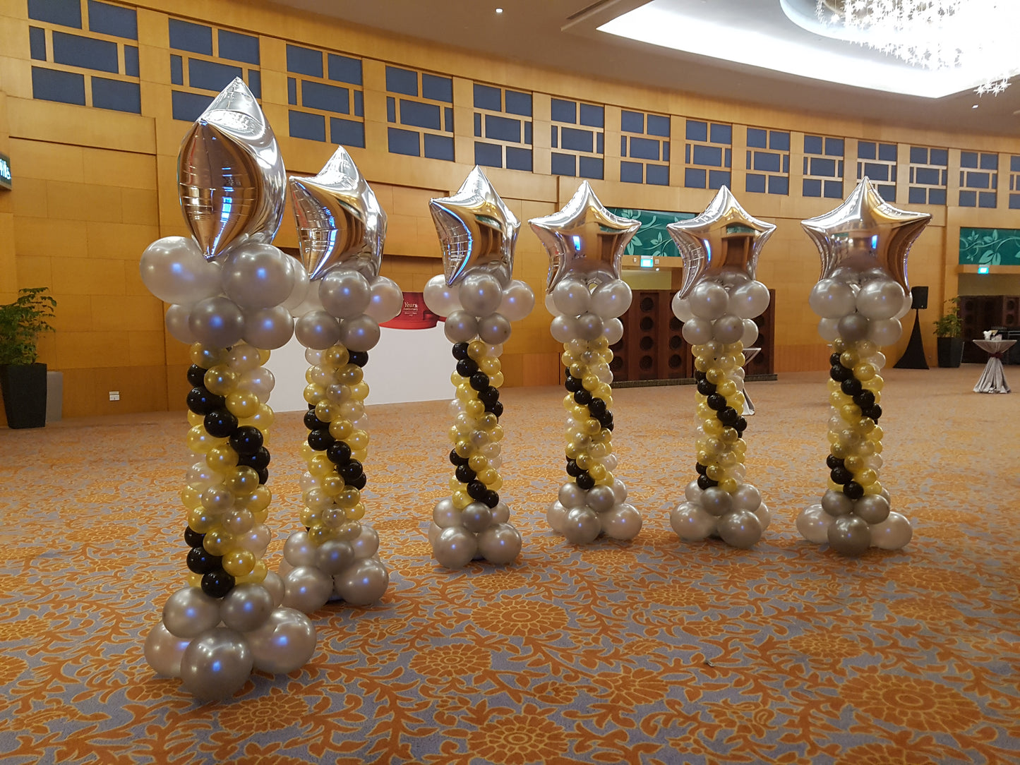 A Pair of Lead-way Balloon Columns with Star On Top