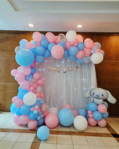 Curtain backdrop with fairy lights and paper pedestals