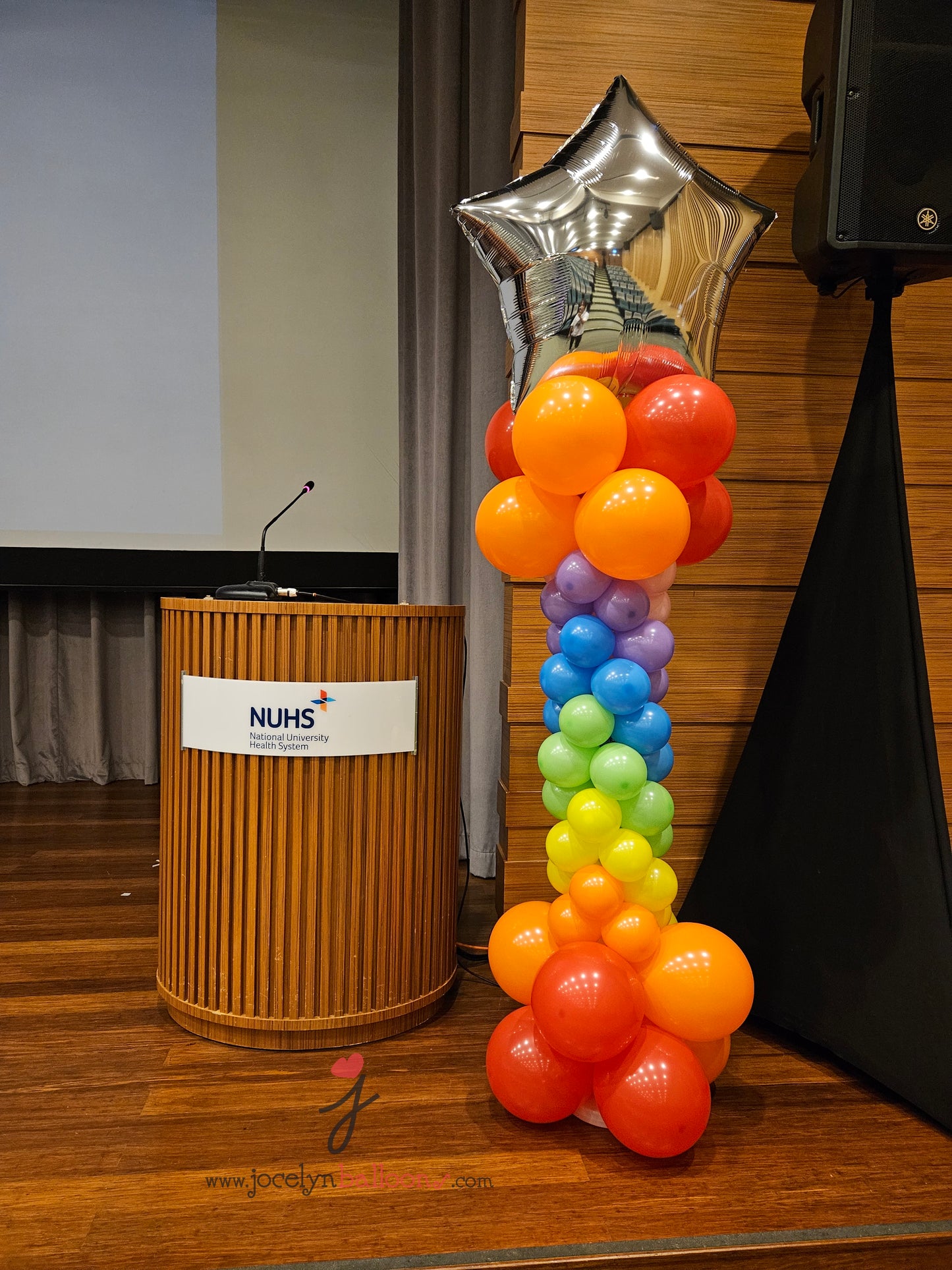 A Pair of Rainbow Star Balloon Columns