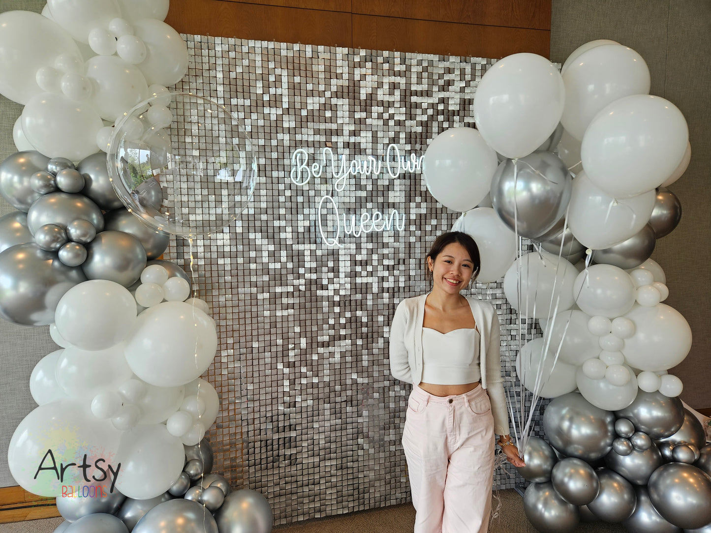 Silver Shimmer Backdrop with Organic Balloon Garland, Plinth Table, LED Signage