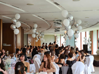 Helium balloon bundle with ribbons