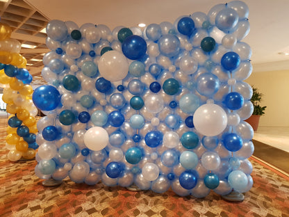 Full balloon wall in blue, white and teal by BalloonClub Singapore