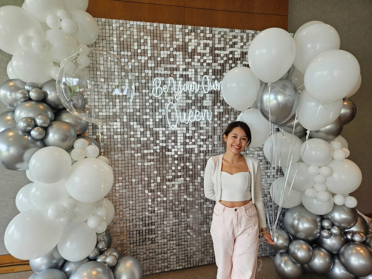 Be Your Own Queen silver shimmer backdrop 3m with white and silver balloon garland and neon sign, Singapore