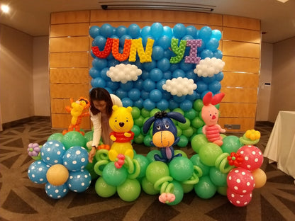 Full balloon backdrop with twisted balloon name letters and balloon characters