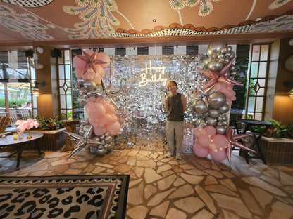 Pink and silver balloon garland with silver shimmer wall and happy birthday neon, Singapore