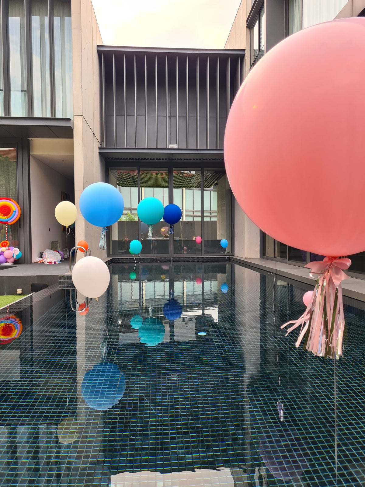 Jumbo 36 inch helium balloons at a pool party