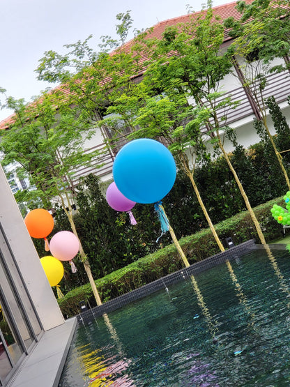 Jumbo 36 inch helium balloons at an outdoor event in Singapore