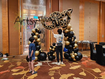 Masquerade Grandeur Balloon Arch in black and gold by BalloonClub Singapore