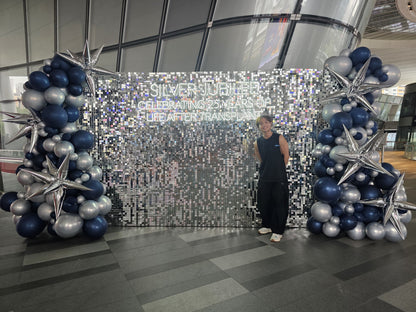 Silver jubilee corporate event silver shimmer backdrop 4m with balloon columns, Singapore