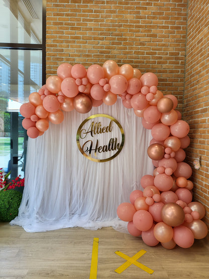 Curtain backdrop balloon garland close-up
